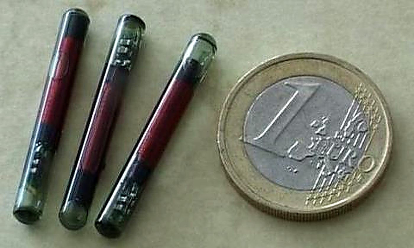 Track+Race passive transponders next to a 1 euro coin